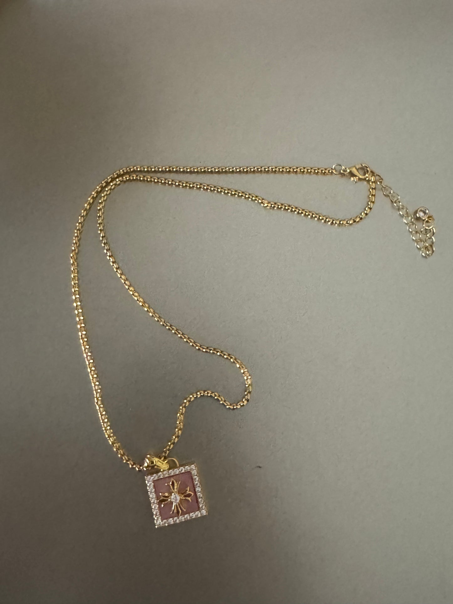gold color corss necklace