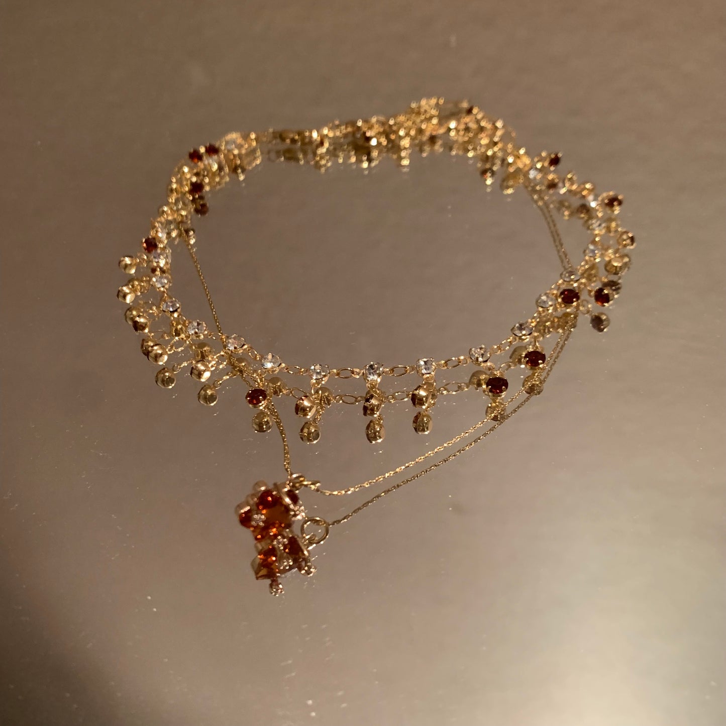 Double-layered necklace with five-pointed star pendant