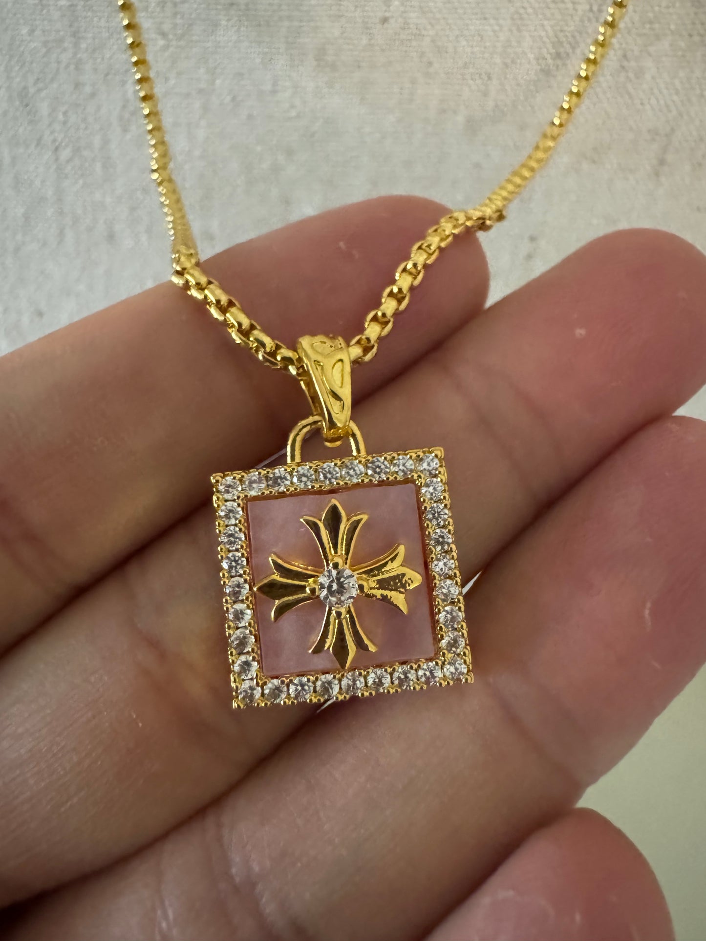 gold color corss necklace