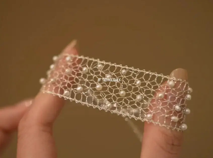 Delicate pearl-embellished lace bracelet, minimalist design for elegant everyday wear