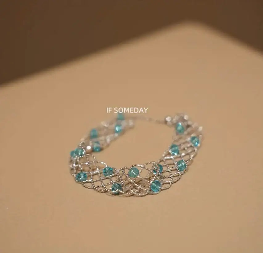 Delicate silver mesh bracelet with turquoise beads, minimalist jewelry design for everyday wear