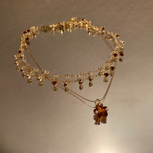 Double-layered necklace with five-pointed star pendant