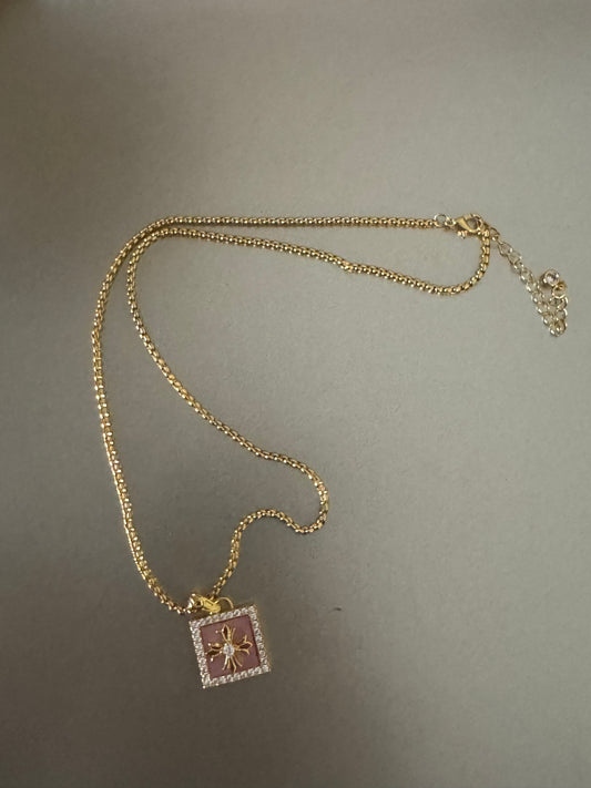 gold color corss necklace