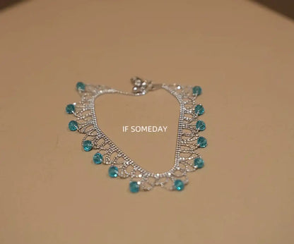 Elegant silver necklace with turquoise beads, minimalist design, perfect for gifting