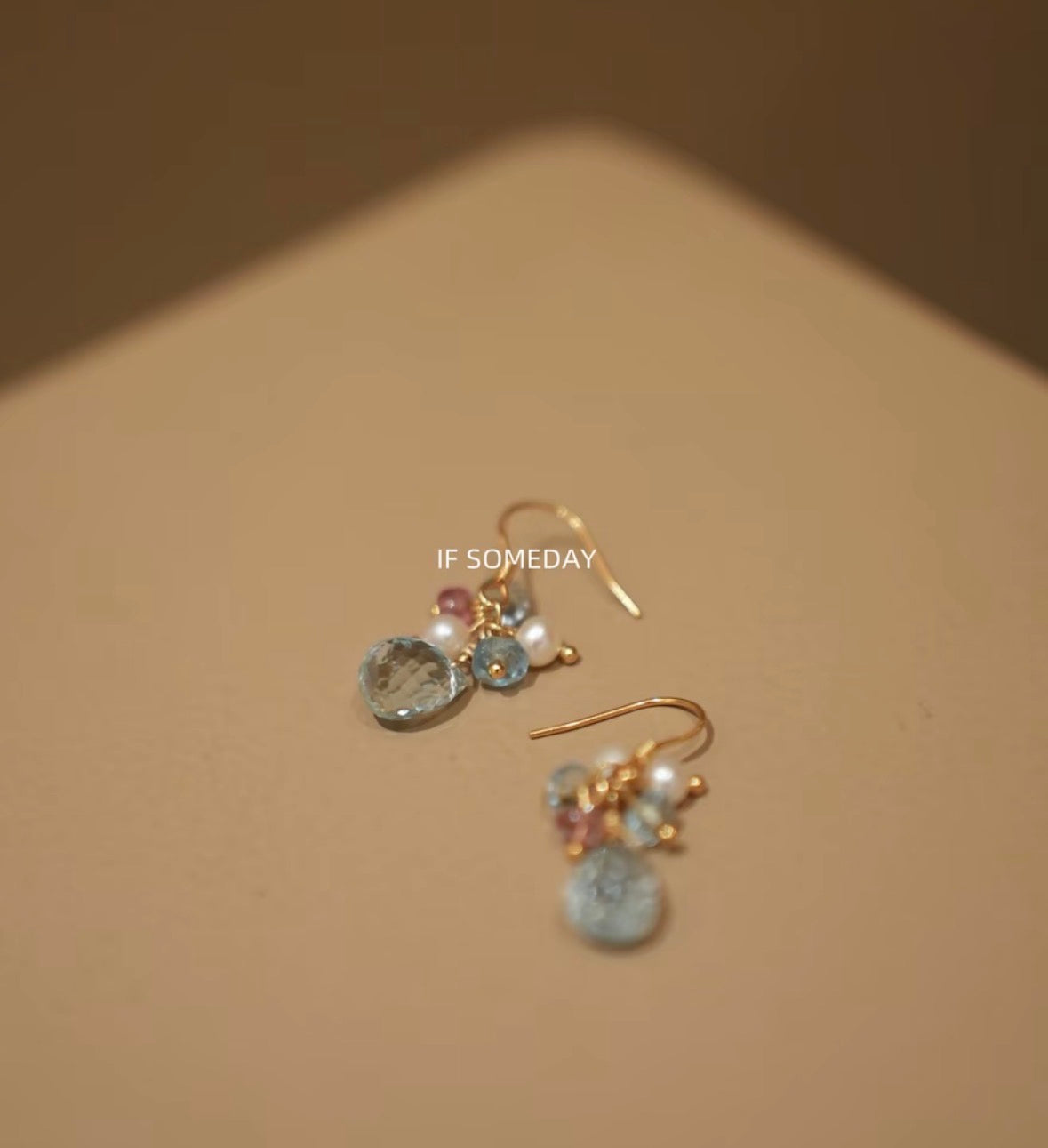 Handmade natural stone earrings with blue topaz
